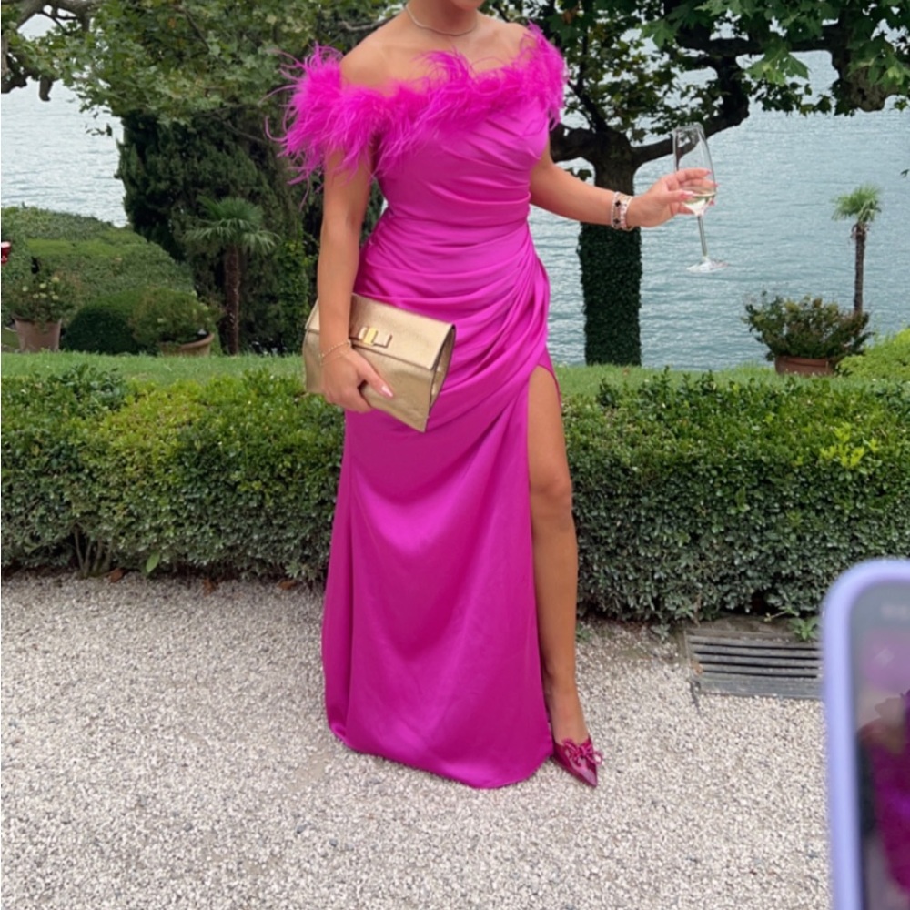 Couture, fuchsia pink silk feather dress with high slit
